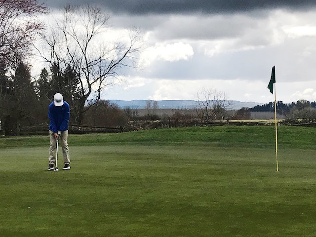 FILE PHOTO - Adna freshman Braeden Salme putts during the Pirates season opener earlier this year.